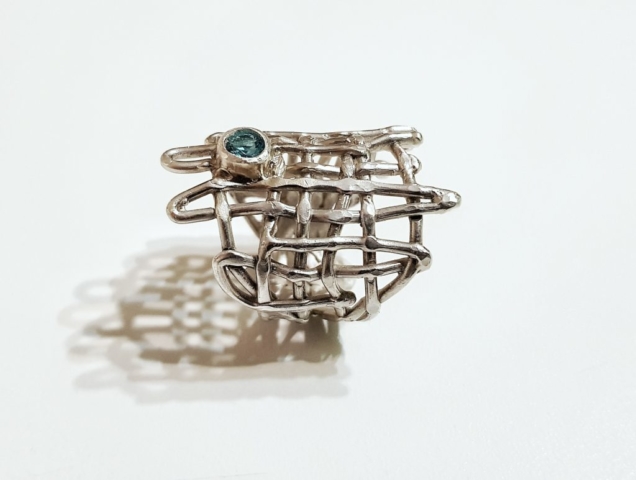 lost wax sterling silver ring with blue zirconia